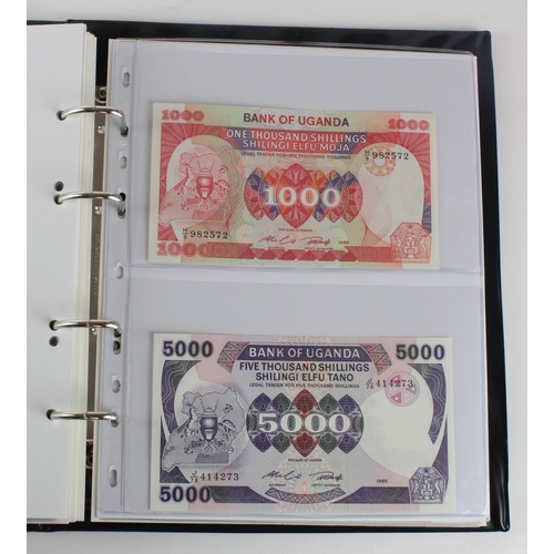 1062 - World, Africa G - U (99) a good group of mostly Uncirculated notes in 2 x Collectors albums, Gambia,... 