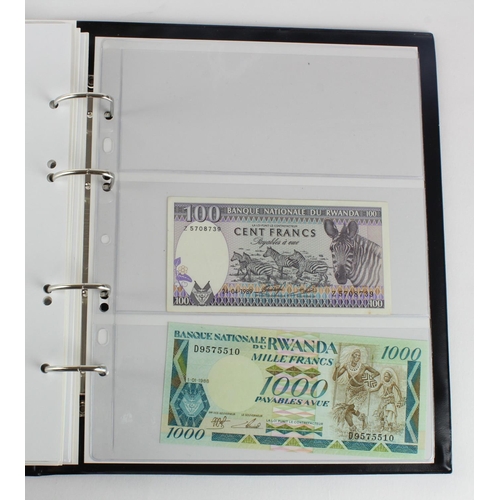 1062 - World, Africa G - U (99) a good group of mostly Uncirculated notes in 2 x Collectors albums, Gambia,... 