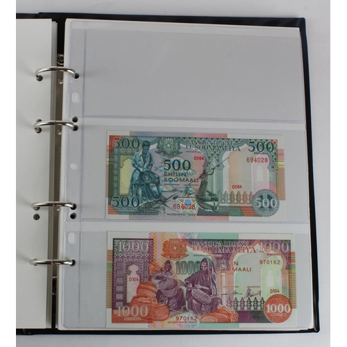 1062 - World, Africa G - U (99) a good group of mostly Uncirculated notes in 2 x Collectors albums, Gambia,... 