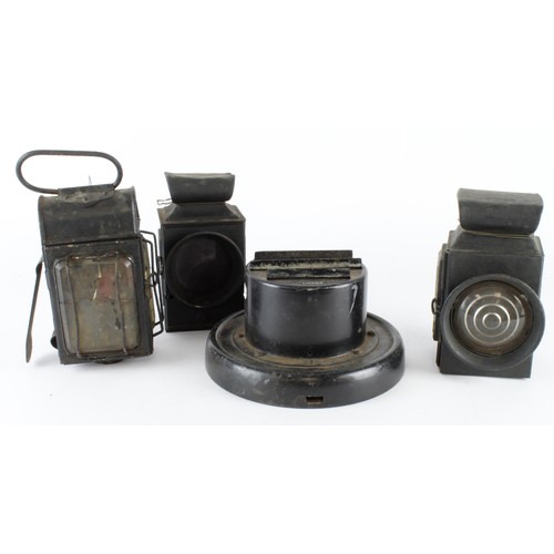 2068 - Box of vintage military lanterns and a WW2 headlight cover. (Buyer collects)