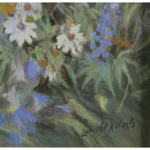 184 - Lancelot Roberts  (1883-1950). Pastel, depicting to a young girl surrounded by flowers, signed by ar... 