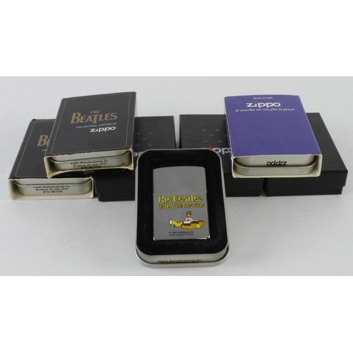 523 - Zippo. A group of seven cased Beatles themed Zippo lighters