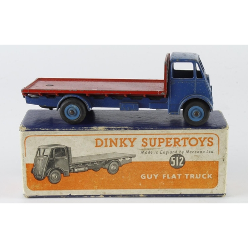 66 - Dinky Supertoys, no. 512 'Guy Flat Truck', blue cab & chassis, mid blue hubcaps with red back, conta... 