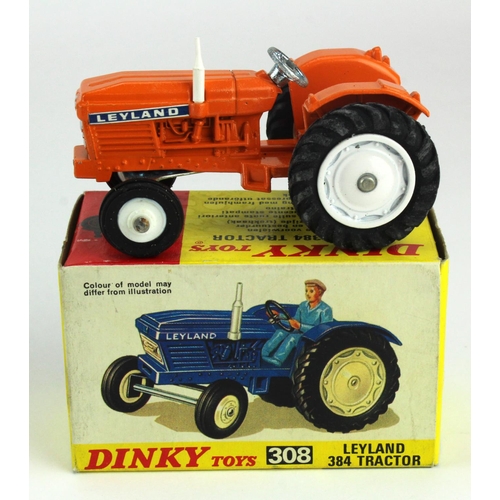 96 - Dinky Toys, no. 308 'Leyland 384 Tractor', orange with white hubcaps, driver present, contained in o... 