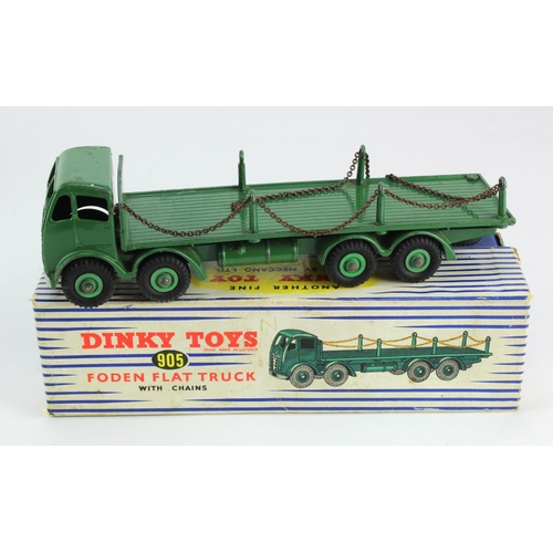 99 - Dinky Toys, no. 905 'Foden Flat Truck with Chains' (green), one pillar detached but present, contain... 