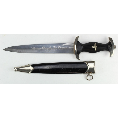 1147 - German SS dagger with scabbard, blade maker marked 'RZM M7/36'. Good quality replica ?