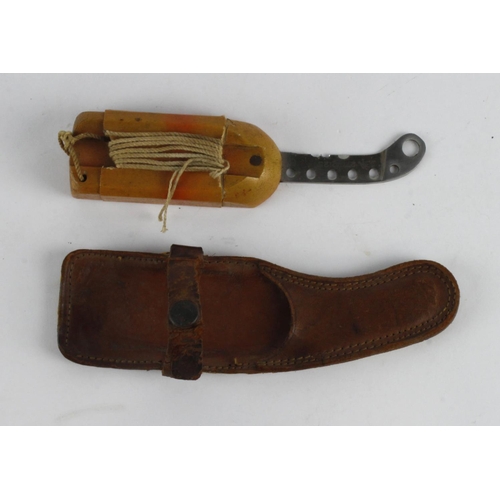 1198 - Small Dinghy Knife in leather scabbard. Blade marked '27C/2125' with arrow stamp