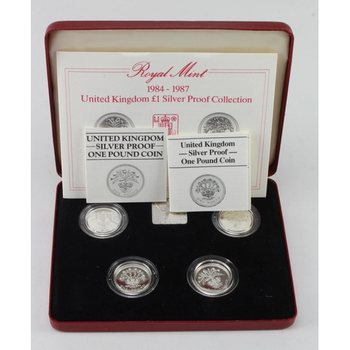 124 - One Pound Silver Proof four coin set 1984 - 1987. FDC in the red case of issued