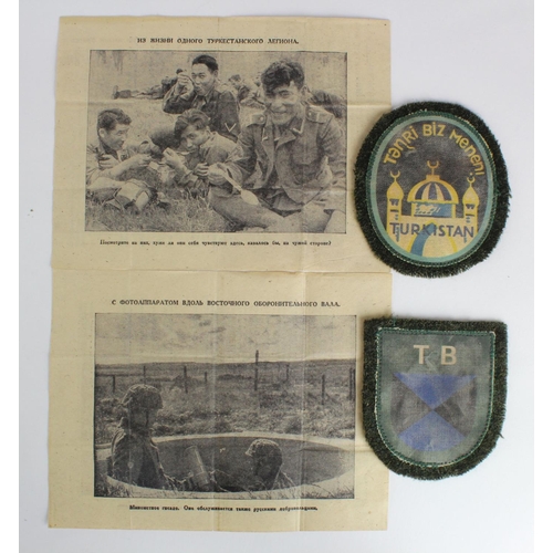 1288 - German Eastern European Air drop leaflets 2x and a Turkistan arm badge.