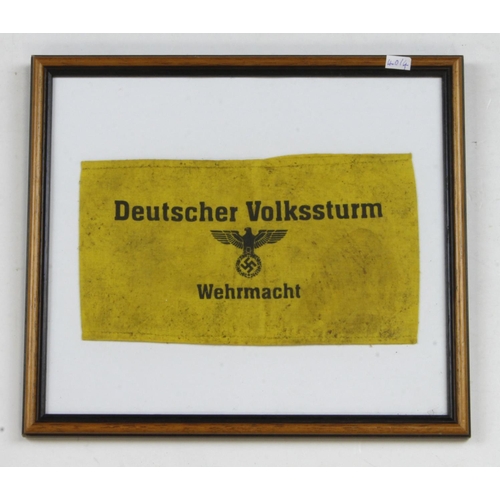 1293 - German framed Deutscher Volkssturm arm band.