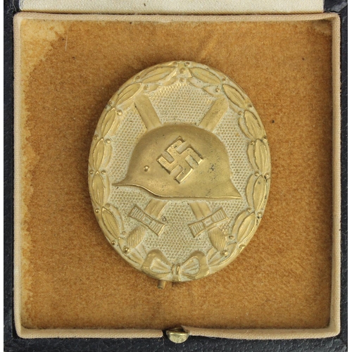 1301 - German Gold Wounds badge in fitted case.