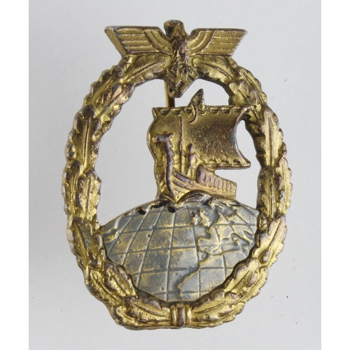 1322 - German Kriegsmarine Auxiliary Cruiser war badge.