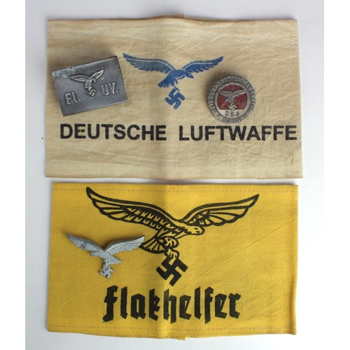 1338 - German Luftwaffe armbands (2) plus cigarette packet protector and 2x badges.