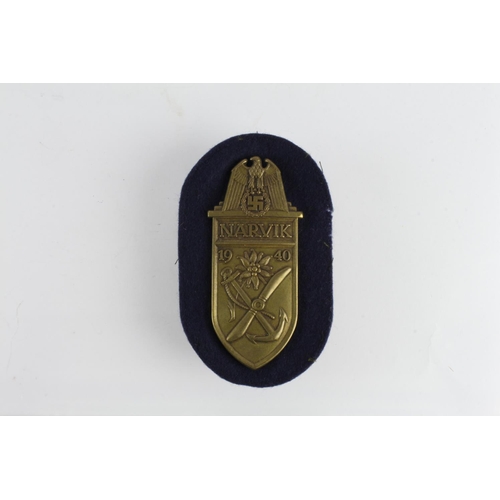 1357 - German Narvik 1940 arm shield on black cloth backing