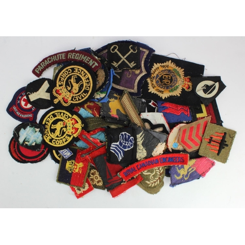 1752 - Cloth Badges: assortment of WW2 and later Formation Sign Badges, Shoulder Titles and Rank badges all... 