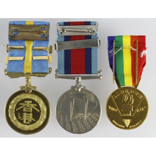 1907 - Normandy Campaign Medal (numbered 703). Hong Kong Service Medal 1950-53 clasp (22442375 Gnr Downey D... 