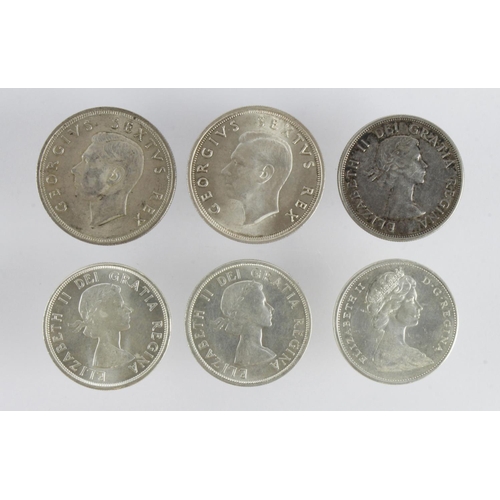 376 - Canada Silver Dollars: 1958, 1960, 1964, and 1965, plus South Africa Crowns 1949 and 1952; EF-UNC