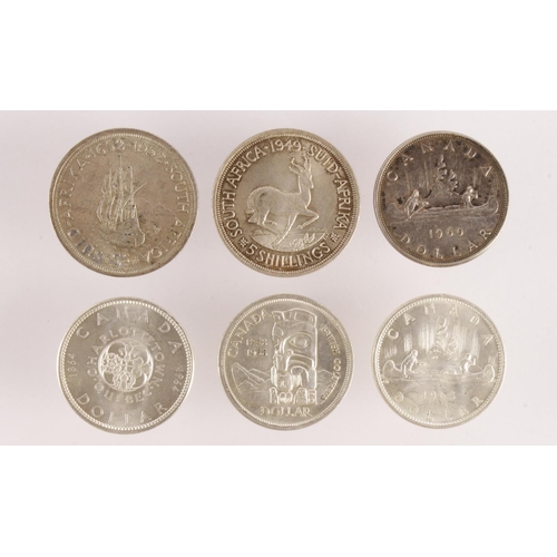 376 - Canada Silver Dollars: 1958, 1960, 1964, and 1965, plus South Africa Crowns 1949 and 1952; EF-UNC