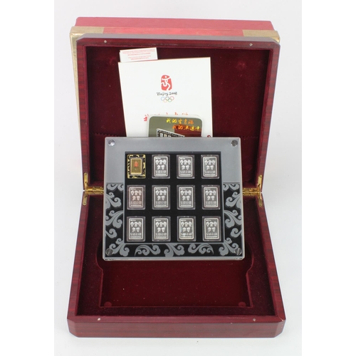 600 - China, Beijing Olympics 2008 official set of ingots: 1x .999 gold 10g, and 11x .999 silver 10g. Case... 