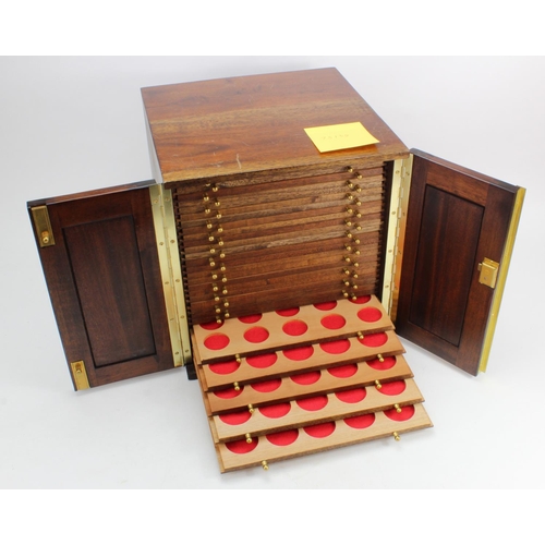 601 - Coin Cabinet: Large mahogany, 28-tray coin cabinet by Peter Nichols, with spaces of various sizes. A... 