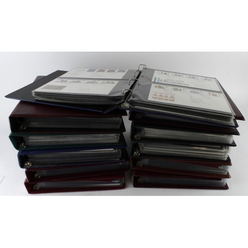 878 - Large and very heavy black crate of GB FDC's (approx 818) in eleven various albums. Nearly all decim... 