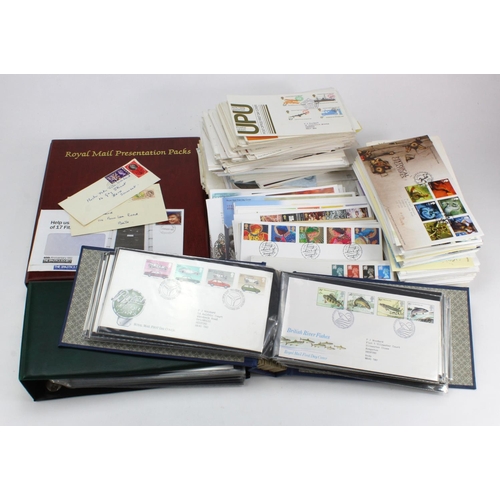 884 - Plastic crate of GB FDC's in albums and loose, from 1951 Festival of Britain x2, to c2002. Includes ... 