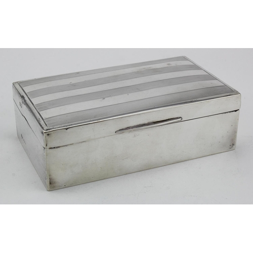 1026 - Silver cigarette box (has a wooden lining) hallmarked Birm, 1925.   Gross weight 14oz approx (includ... 