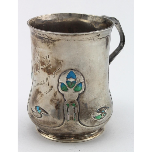 1034 - Small silver tankard in the style of Archibald Knox, engraved 