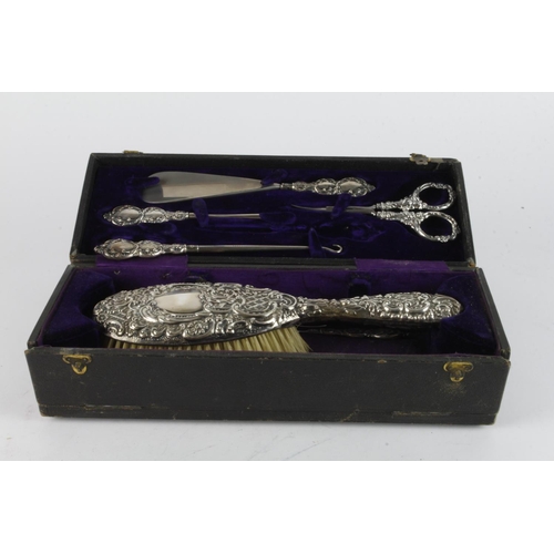 1039 - Boxed silver mounted Ladies brush & manicure tools, shoehorn & button-  hook set (missing the comb) ... 