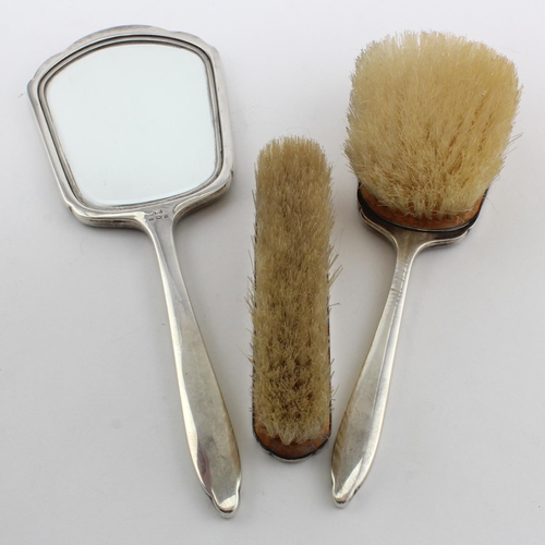 1040 - Engine turned part silver mounted dressing table set comprising hand mirror, hair brush & clothes br... 