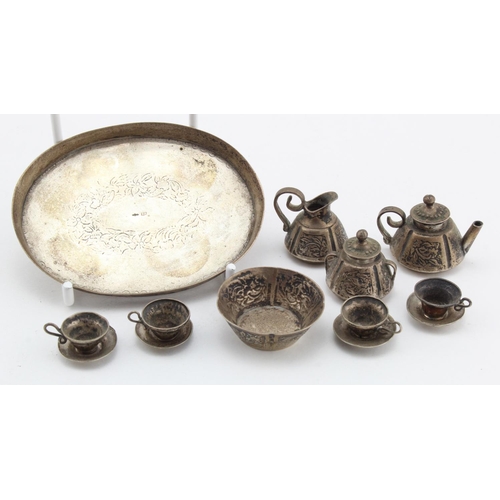 1042 - Dutch silver miniature dollshouse tea set, circa 19th Century, comprising teapot, sugar bowl (with l... 