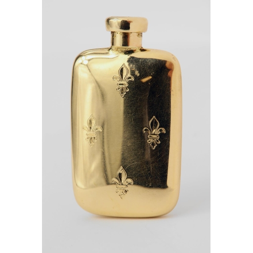 1056 - Yellow gold (tests 14ct) flask shaped perfume bottle, hand engraved with four fleur-de-lys, screw to... 