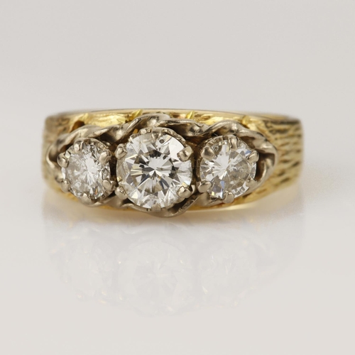 132 - Yellow gold (tests 18ct) diamond trilogy ring, set with three round brilliant cut graduating diamond... 