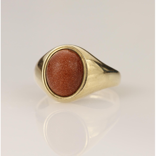 148 - 9ct yellow gold signet ring set one oval cabochon cut sandstone measuring 9.5mm x 7.5mm, finger size... 