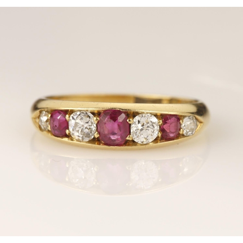 157 - 18ct yellow gold Victorian diamond and ruby boat shaped ring, set with three graduating oval rubies ... 