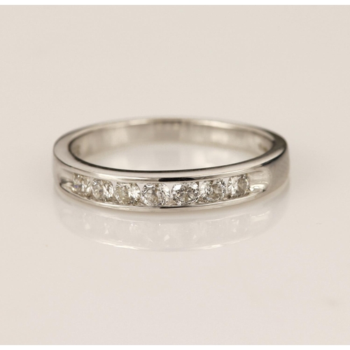 163 - 18ct white gold diamond half eternity ring, set with seven modified round brilliant cut diamonds, to... 