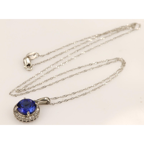 318 - Platinum tanzanite and diamond pendant, one round AAAA tanzanite approx 2.70ct, surrounded with a ta... 