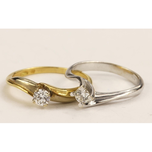 570 - Two diamond solitaire rings to include white gold (tests 18ct) compass set diamond approx 0.20ct. Ye... 