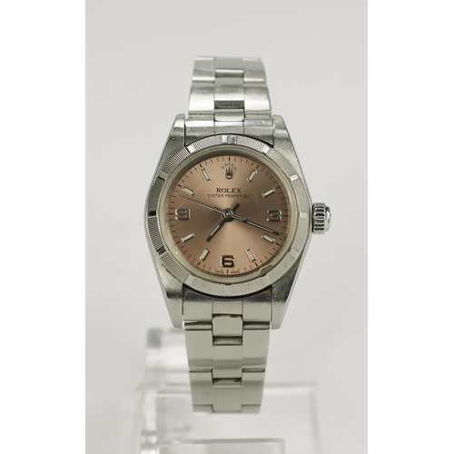 593 - Ladies stainless steel cased Rolex Oyster circa 2007. The pink dial (some scuffs to the glass) on a ... 