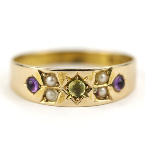 65 - 15ct yellow gold Victorian suffragette ring, set with one cabochon peridot, two cabochon amethysts a... 