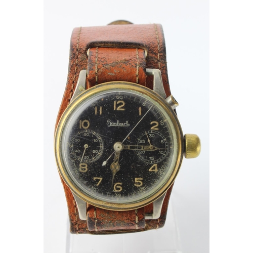 652 - WWII German military single button chronograph wristwatch, the black dial with Arabic numerals and a... 