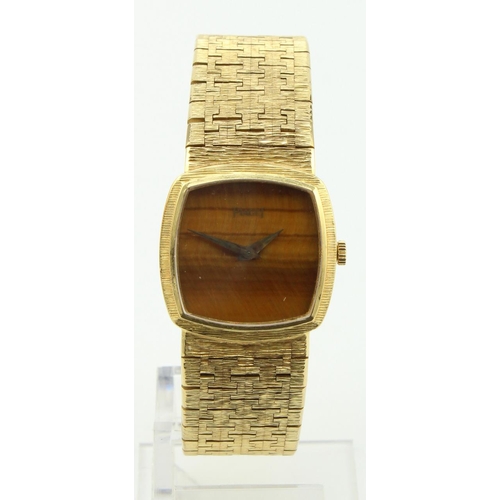 680 - Ladies 18ct gold cased Piaget manual wind wristwatch. The wood effect dial with an integral 18ct bra... 