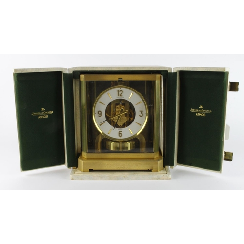 826 - Jaeger LeCoultre Atmos clock, gilt metal with five glass panes, Arabic numerals to dial, with origin... 