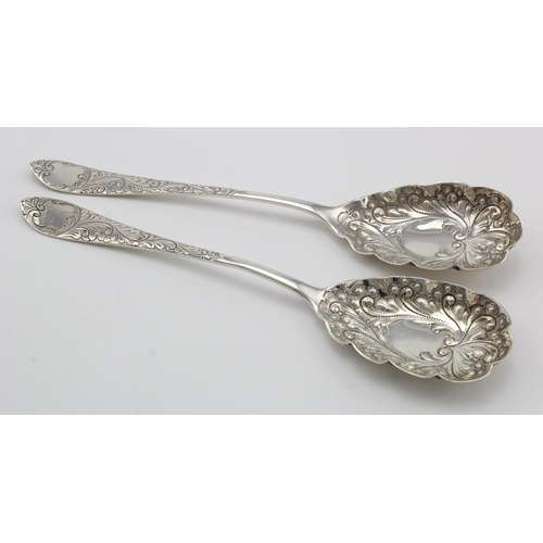 892 - Pair of silver berry type fruit spoons hallmarked. HA Sheffield 1900 & 1901.   Weight of both 3.5 oz... 