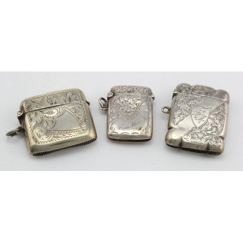 909 - Three engraved silver vesta cases, various makers & dates.   Total weight of three items is 2.25oz a... 