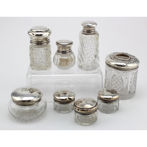 961 - Eight silver topped & glass toilet jars (one damaged) plus a large glass & silver powder bowl (silve... 