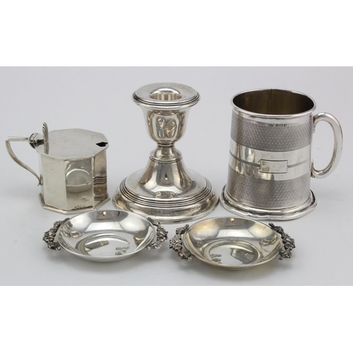 986 - Mixed lot of silver comprising a christening mug hallmarked Birm. 1941, dwarf candlestick with a loa... 