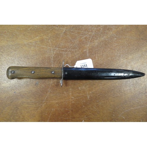 1151 - German WW2 boot knife in its black painted scabbard,