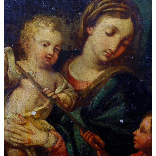 879 - Manner of Carlo Maratta. Oil on panel depicting the Madonna and child with the infant St John the Ba... 