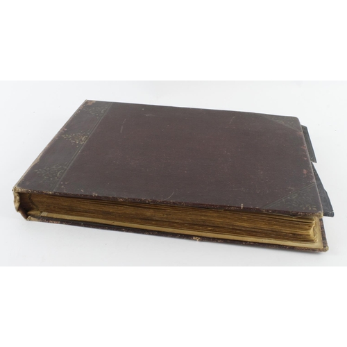 120 - Photograph album. An album containing approximately sixty large black & white photographs, including... 